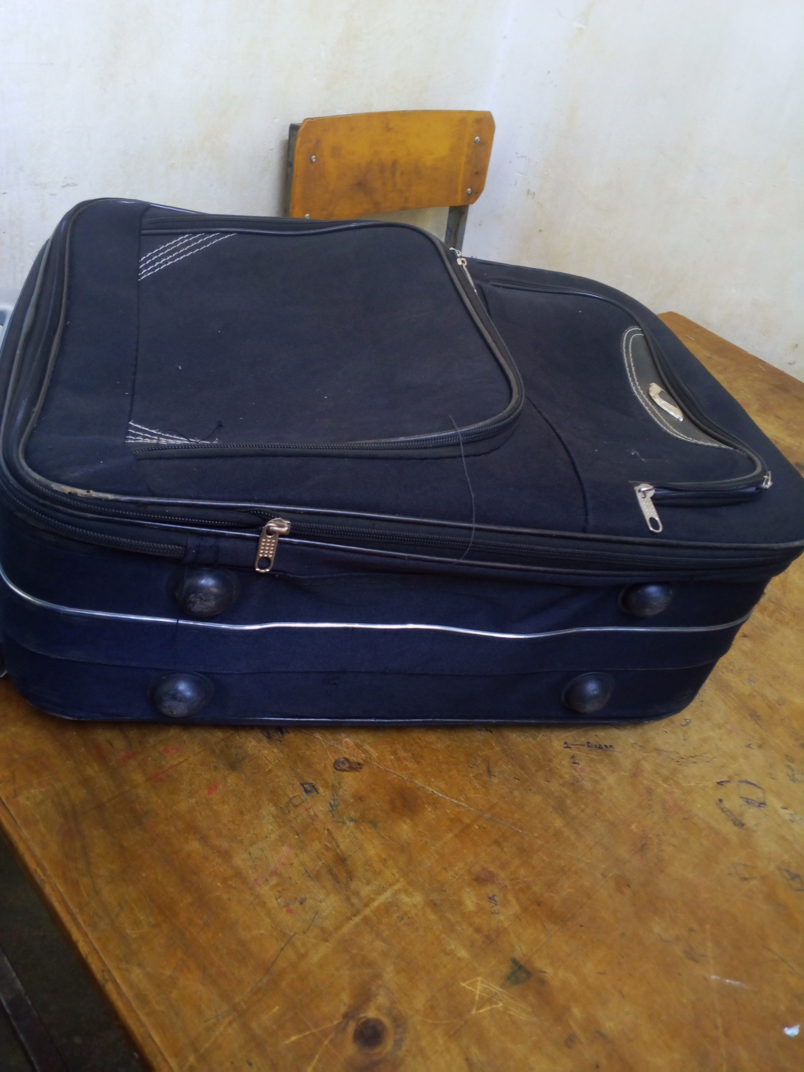 Gently used suitcase